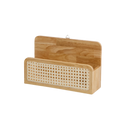Wooden and wicker magazine rack on a white background