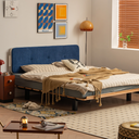 Modern bedframe with wooden base and blue upholstered headboard in a stylish bedroom setup