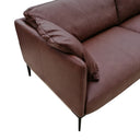 CODA brown leather sofa corner with smooth cushions and slender black metal legs