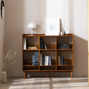 Patina Book shelf cabinet by Born in Colour with wooden finish holding books and decor items